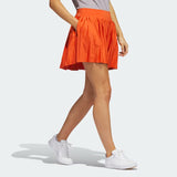 ADIDAS WOMEN'S ULTIMATE365 TOUR PLEATED 15" GOLF SKORT - PRELOVED RED