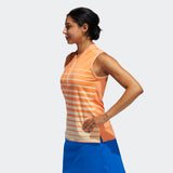 ADIDAS WOMEN'S ENGINEERED STRIPE SLEEVELESS GOLF POLO SHIRT - AMBER TINT