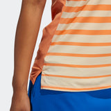 ADIDAS WOMEN'S ENGINEERED STRIPE SLEEVELESS GOLF POLO SHIRT - AMBER TINT