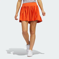 ADIDAS WOMEN'S ULTIMATE365 TOUR PLEATED 15" GOLF SKORT - PRELOVED RED